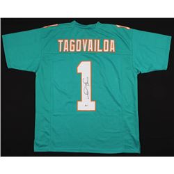 TUA TAGOVAILOA SIGNED MIAMI DOLPHINS JERSEY ( JSA COA)