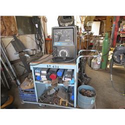 MILLER THUNDERBOLT WELDER C/W ROD & CART