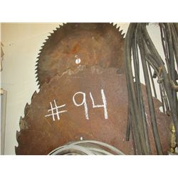 2 SAW BLADES (MANDRAL) ALONG EAST WALL