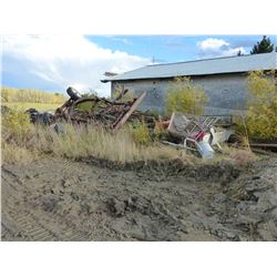 PILE OF IRON NORTH OF GARAGE & TIRES