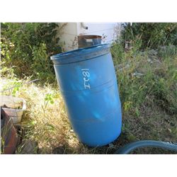 BLUE PLASTIC DRUM, GREEN WATER PUMP HOSE