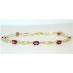 1054 10K Gold Bracelet w/ Garnet