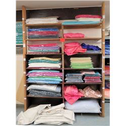 Shelving Unit and Contents: Cleaned Tablecloths & Runners