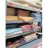 Image 1 : Industrial Shelving Unit with Cleaned Tablecloths