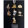 Image 2 : 7 Vintage GoldTone Enamel Charms. Snoopy, Santa, Shoe,Elephants