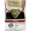 Image 1 : Beautiful Antique Silver Brooch With Gilded Leaves and Feathers Highlited with a Green Peridot Glass