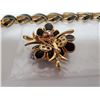 Image 3 : 792.  Gold tone and black bracelet and broach
