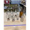 Image 1 : 7 CLEAR BOTTLES + ONE BROWN BOTTLE/JUG