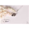 Image 2 : Strand of freshwater cultured 74" pearl necklace with white metal clasp. Retail replacement value $1