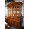 Image 1 : Chest on chest breakfront china cabinet with illuminated top section, glass doors and shelves and ra