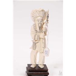 Genuine elephant tusk scrimshaw carving of an Asian fisherman, 6  in height plus rosewood plinth