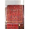 Image 1 : 100% handmade Irak wool area carpet with overall floral design, red background and highlights of nav
