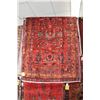 Image 1 : 100% handmade Irak wool area carpet with overall floral design, red background and highlights of nav