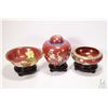 Image 1 : Three pieces of Oriental Cloisonne, each with cinnabar coloured background including 8" bowl decorat