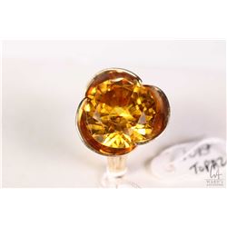 10kt yellow gold flower motif ring set with large topaz gemstone