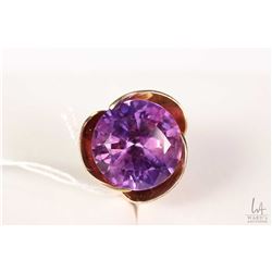 10kt yellow gold flower motif ring set with large amethyst gemstone