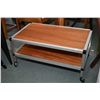 Image 1 : Quality aluminium framed and teak two tiered occasional table on castors, approximately 30" X 18"