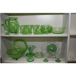 Selection of green depression glass including pitcher and eight glasses, six small dishes, pair of c