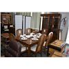 Image 1 : Eight piece oak dining suite including large table with two skirted insert leaves, six rattan dining