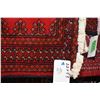 Image 2 : 100% Iranian wool scatter rug with red background and fringed sides, 22" X 53"