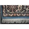 Image 2 : Large wool blend area carpet with center medallion, floral and foliage design in shades of blue, tau