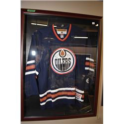 Shadow box open able framed Oilers signed Jersey with multiple signatures including Ryan Smyth etc..