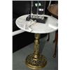 Image 2 : Two single pedestal brass based and marble top side tables