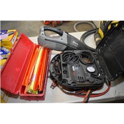 Selection of automotive accessories including safety reflector kit, booster cables, Shark cordless v