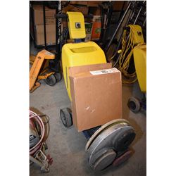 Cimex floor cleaning unit with partial box of pads, appears to be working