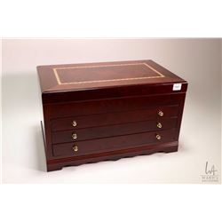 Lady's three drawer jewellery box with flip lid, fold out mirror and inlaid marquetry top, includes 