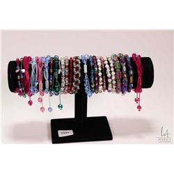 Large selection of beaded bracelets including crystal, genuine pearl, glass beads etc.