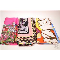 Three large Hermes silk scarves with hand rolled and hand stitched edges-note assume not authentic