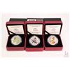 Image 1 : Three Royal Canadian Mint cased collector coloured coins including 2012 Rose-breasted Grosbeak 25 ce