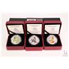 Image 1 : Three Royal Canadian Mint cased collector coloured coins including 2012 Rose-breasted Grosbeak 25 ce