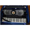 Image 2 : Black and white Titano Palmer-Hughes accordion in hard case