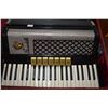 Image 2 : Black, cream and silver Scandalli accordion with hard and soft cases