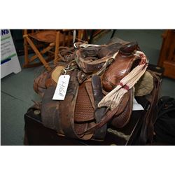 Hand tooled western saddle and bridle