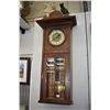 Image 1 : Antique wall hanging wood cased clock with visible pendulum behind six bevelled glass panels, not wo