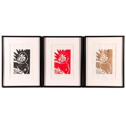 Three framed block prints