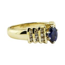 1.30 ctw Oval Brilliant Blue Sapphire And Diamond Ring - 14KT Yellow Gold