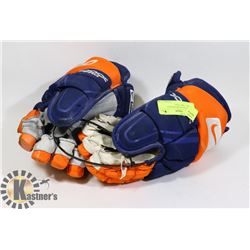GAME USED OILERS HOCKEY GLOVES  - ERIC COLE