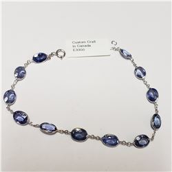 48) 14KT WHITE GOLD SAPPHIRE BRACELET.