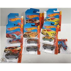 12 DIE CAST CARS. NEW IN PACKAGE.