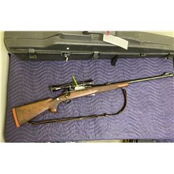 WINCHESTER MODEL 70, 375 H&H MAGNUM, BOLT ACTION, SERIAL #350083, WITH LEUPOLD SCOPE, HARD CASE AND