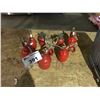 Image 1 : 7 OIL DISPENSING CANS
