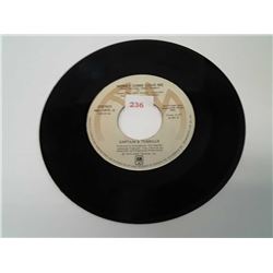 Captain and Tennille 45 side one honey come love me side two Muskrat Love fair condition