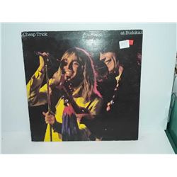 Cheap Trick bud okan has the book inside side a has a bad scratch
