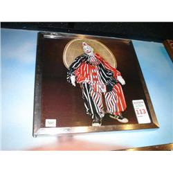 Clown sitting on wicker chair print beh