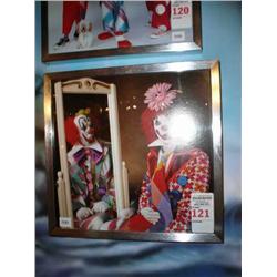 clown in mirror in metal frame