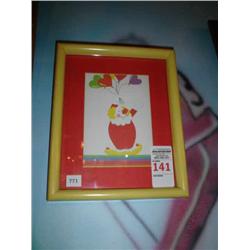 Clown with balloon print in yellow wood